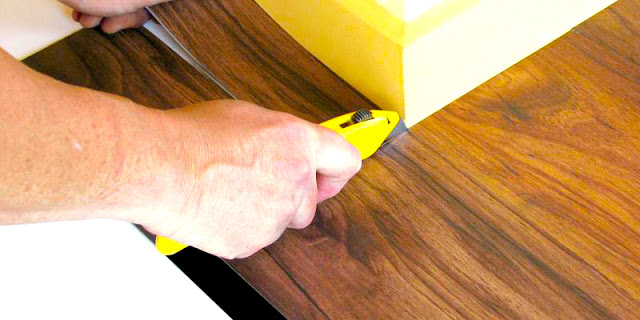 cutter-for-installing-vinyl-foor-tiles-andcost-of-installing-vinyl-flooring