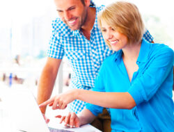 Couple working-on-laptop-in-office-for-buy-new-house-online