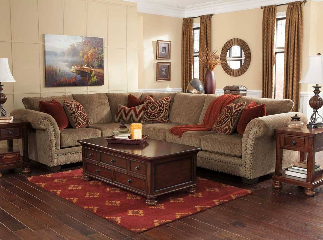 living rooms with brown leather sectionals couch furniture and wooden coffee table with storages