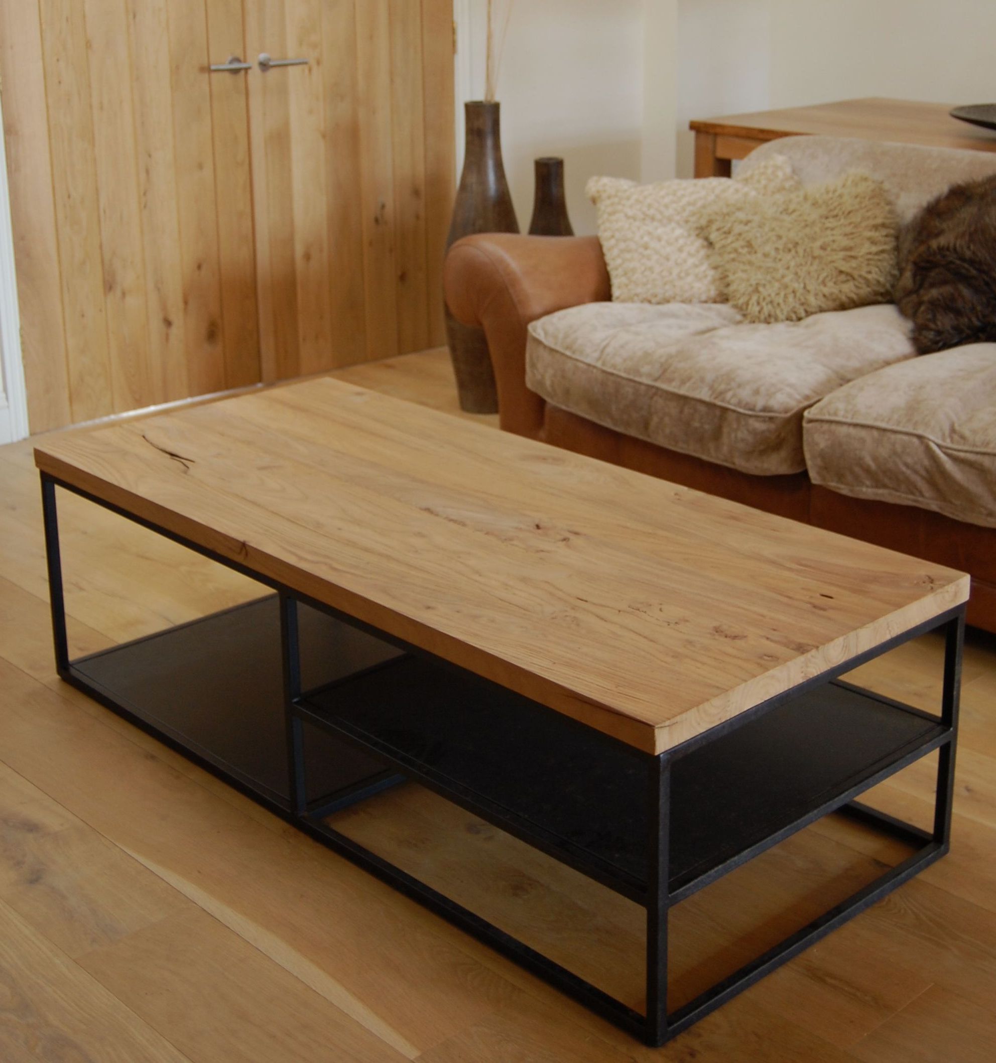 Home magazine shows you how to construct a simple coffee table with a concealed storage space.