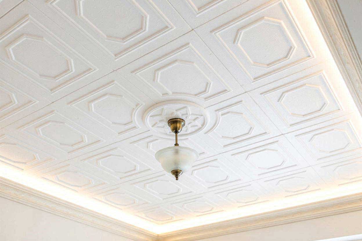 Close-up of lightweight styrofoam decorative ceiling tiles with elegant embossed geometric patterns.